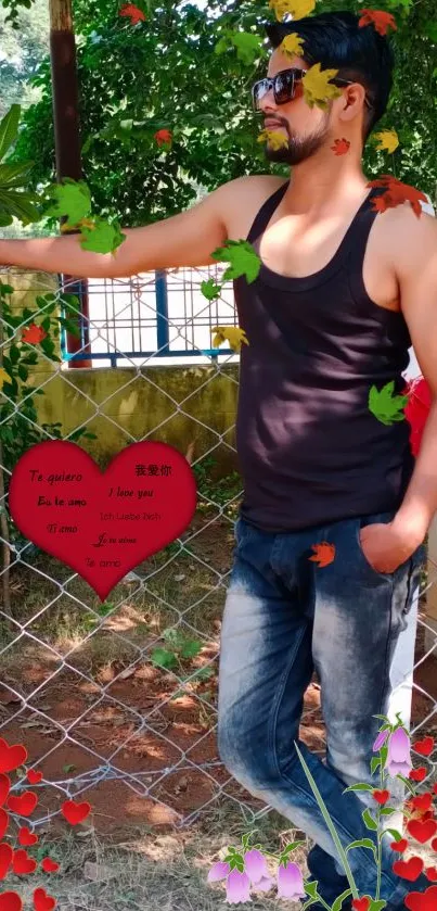 Man in black tank top outdoors with colorful heart decorations.