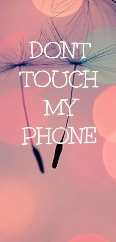 Pink dandelion wallpaper with 'Don't Touch My Phone' text.