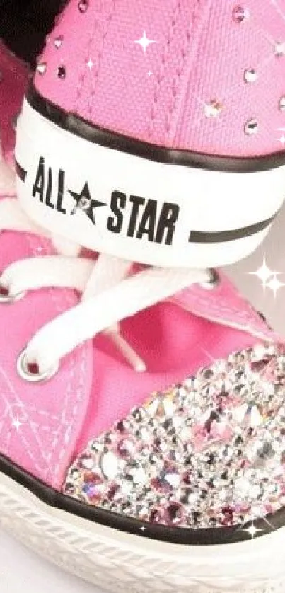 Close-up of stylish pink sneakers with rhinestones.