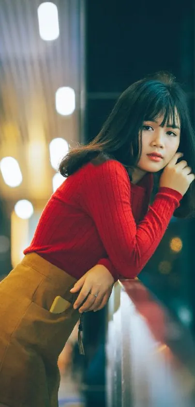 Young woman in urban setting with stylish outfit.