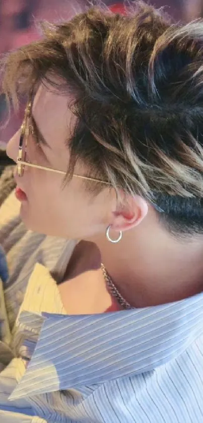 Close-up portrait with trendy hairstyle and accessories.