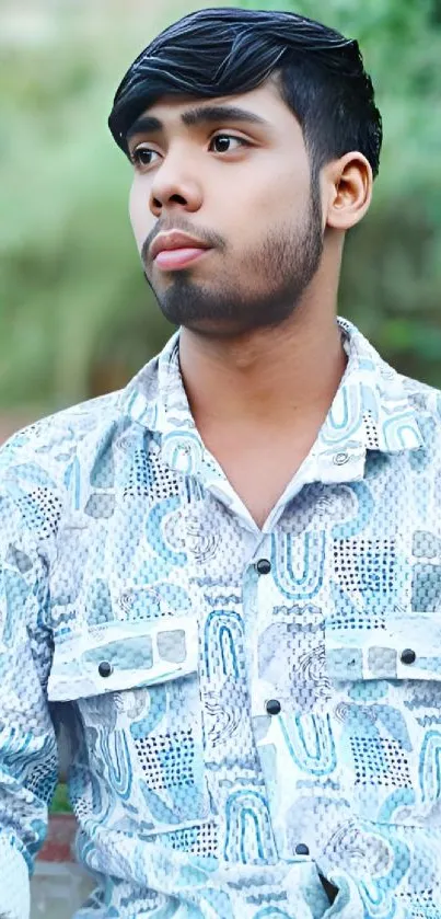 Young man in patterned shirt, stylish portrait wallpaper.