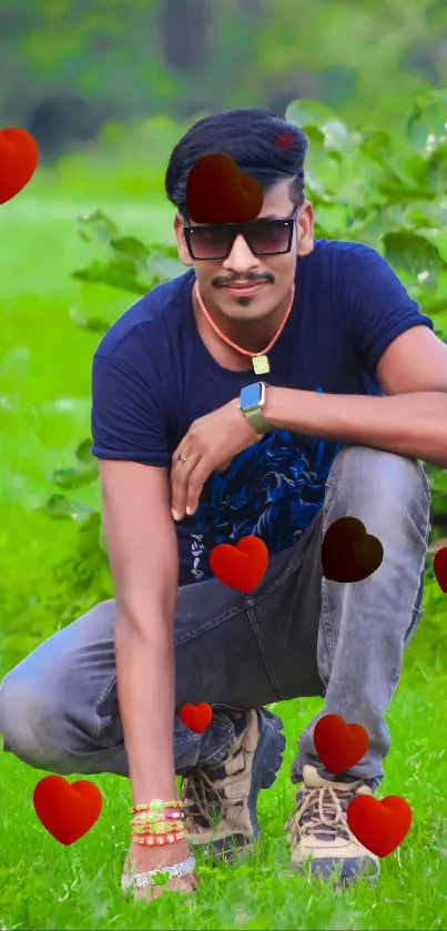 Man posing with heart effects in nature background.