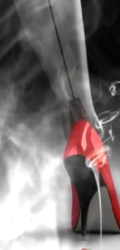 A red high heel crushing a cigarette with smoke on a gray and black background.