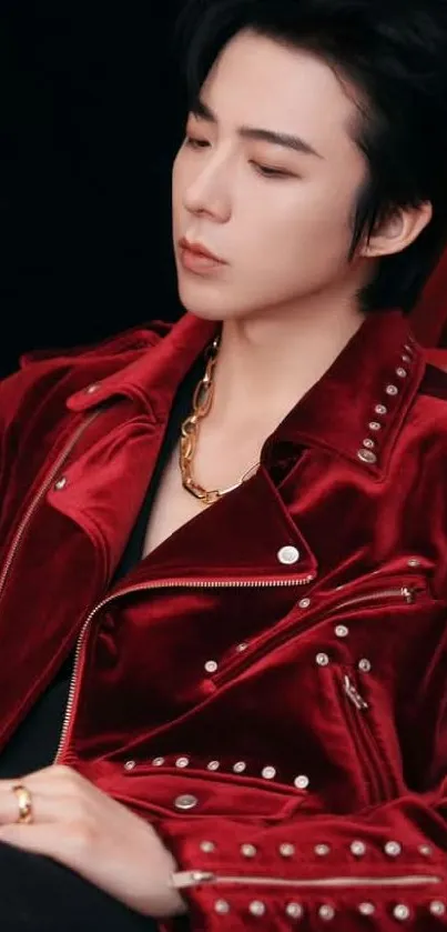 Portrait of a person in a red velvet jacket.