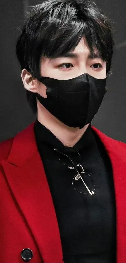 Stylish individual in a red jacket with a black mask, modern mobile wallpaper.