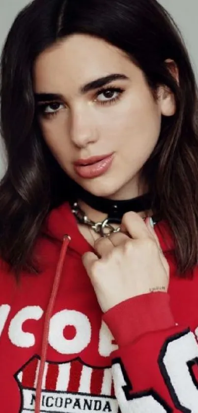 Portrait of a girl wearing a red hoodie with a modern style.