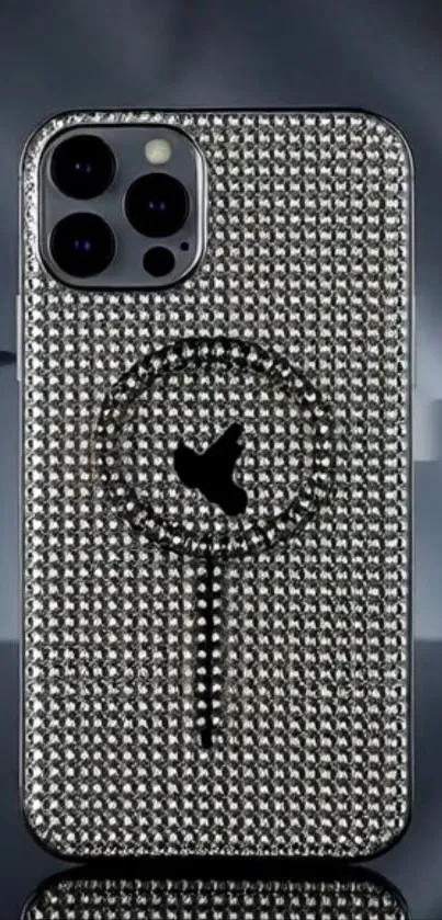 Close-up of a rhinestone-studded phone case with stylish design.