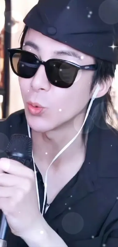 Mobile wallpaper featuring a stylish singer with sunglasses and microphone.