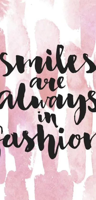 Chic mobile wallpaper with a smile quote on a pink watercolor background.