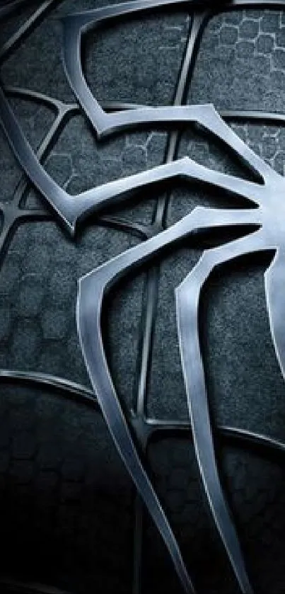 Silver spider emblem on textured black wallpaper.