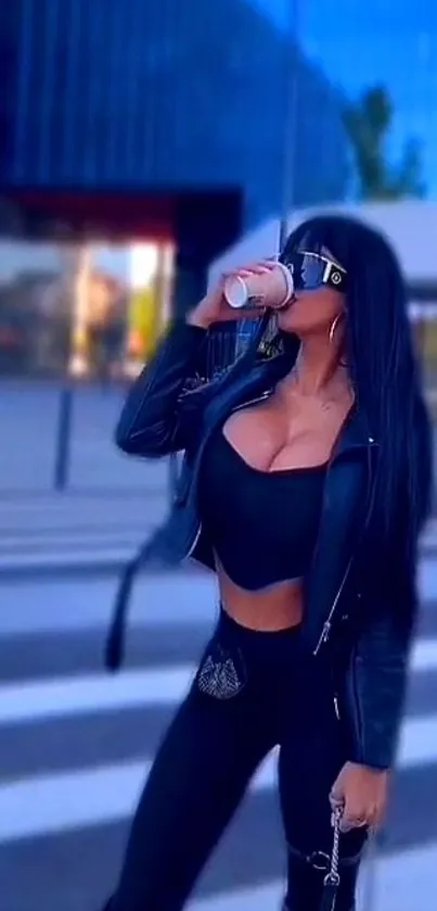 Woman in stylish black outfit drinking coffee, urban background.