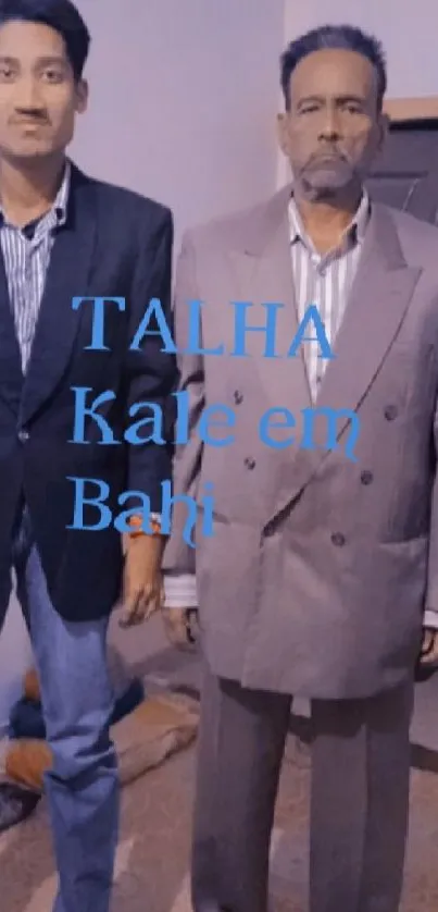 Two men in suits with text overlay, home setting.