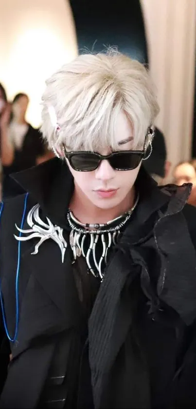 Fashion-forward individual wearing sunglasses with unique accessories.