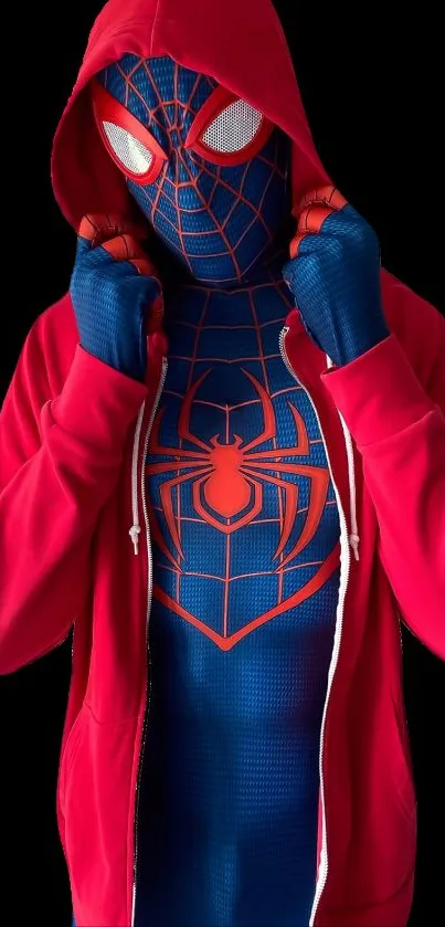 Superhero in blue and red suit with a hoodie, striking a dynamic pose.