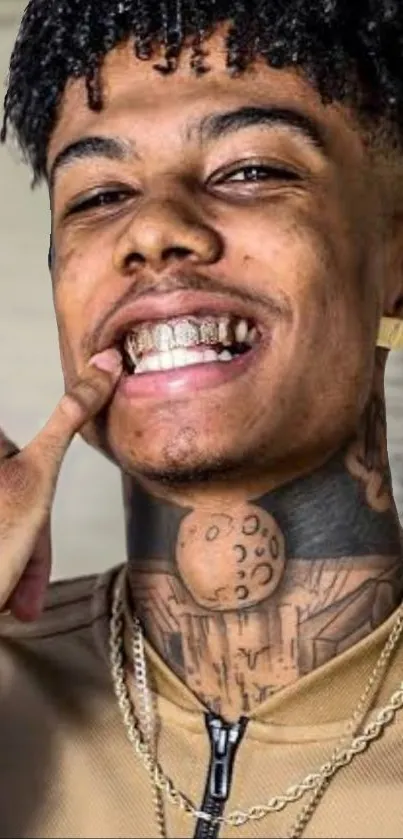 Young stylish man with tattoos smiling, showing grille.