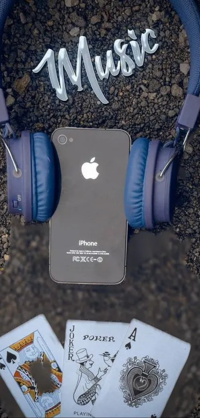 iPhone with headphones and playing cards creatively designed.