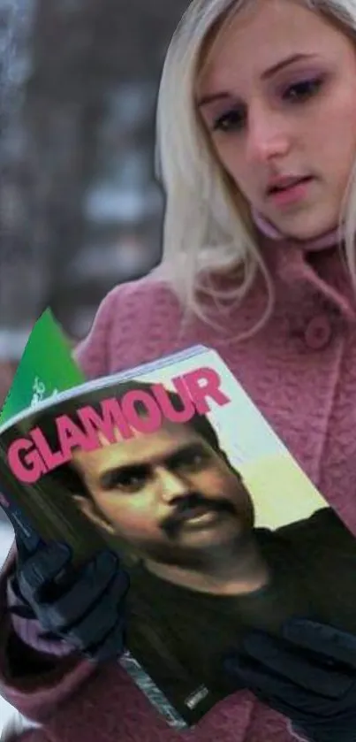 Blonde woman in pink coat reads Glamour magazine.