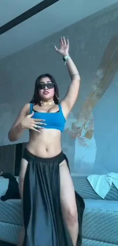 Woman posing stylishly in modern room.
