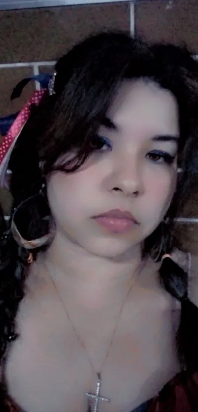 Portrait of a woman with braided pigtails and stylish accessories.