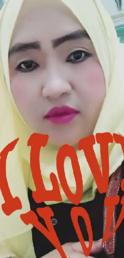 Woman in yellow hijab with 'I Love You' text overlay.