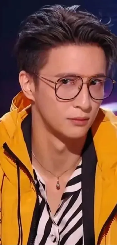 Person wearing a yellow jacket and glasses with a stylish and modern vibe.