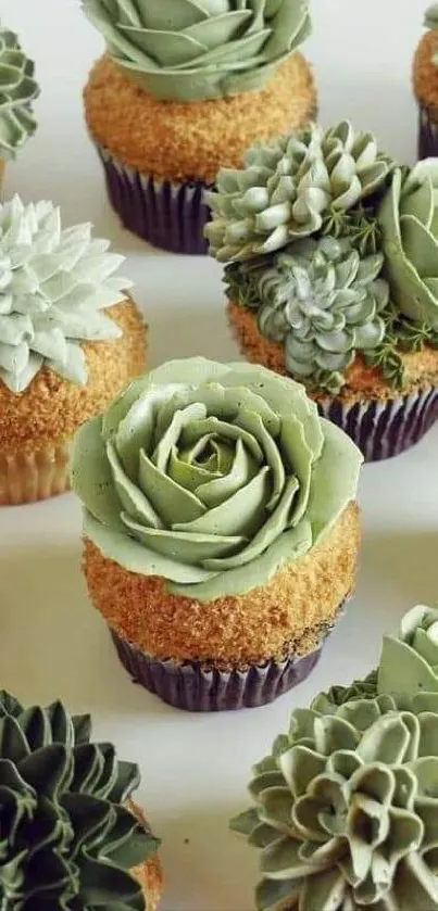 Cupcakes designed to look like green succulents, arranged creatively.