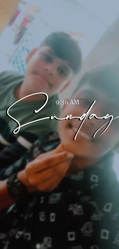 Wallpaper of two people with Sunday text overlayed.