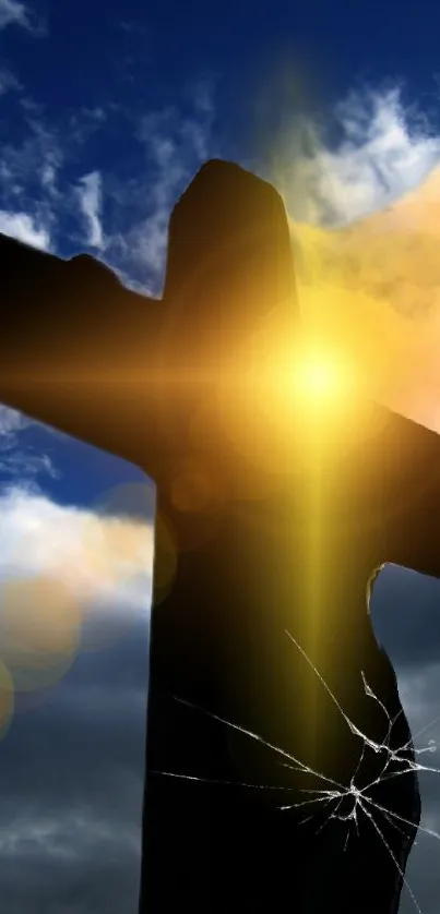 Silhouetted cross against a sunlit sky with clouds, creating a spiritual scene.