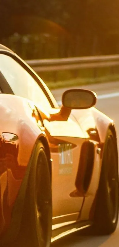 Red sports car on highway during sunset.