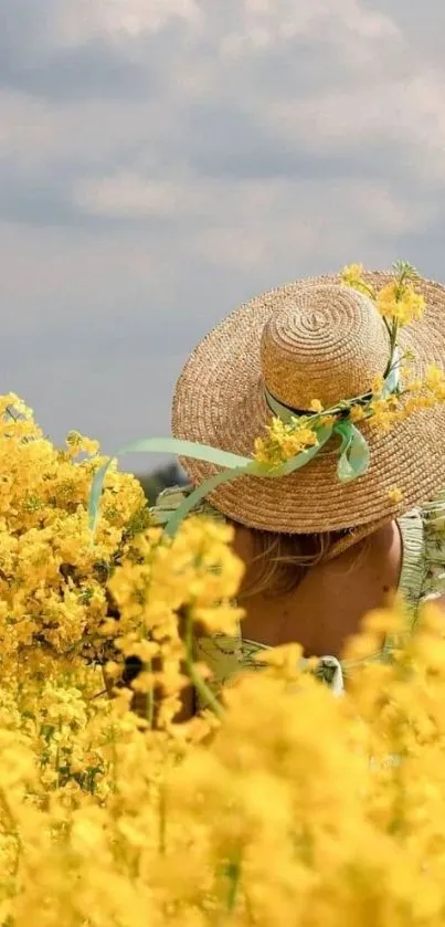 Woman in hat in sunny yellow flower field