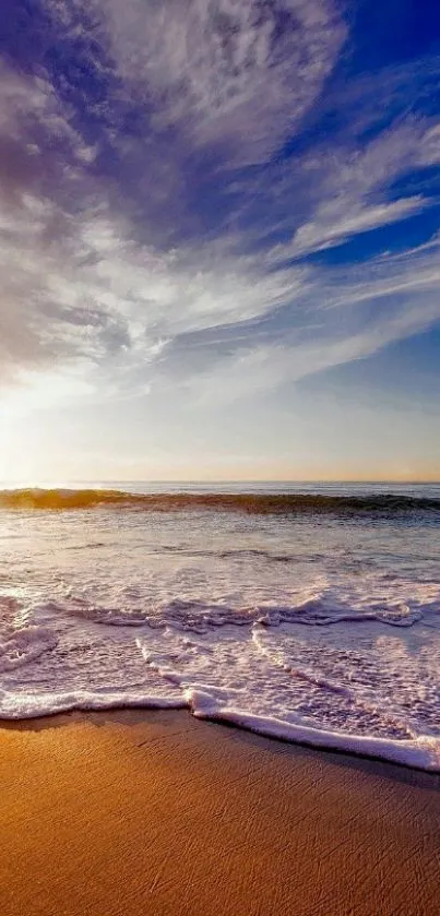 Beautiful beach sunrise with ocean waves and vibrant sky.