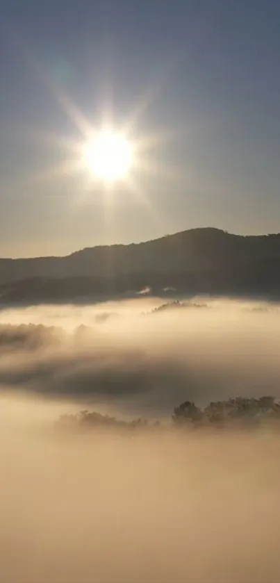 Sunrise over misty mountains with a golden glow and serene landscape.