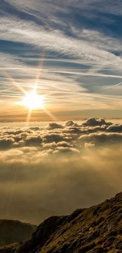 Sunrise over clouds and mountain peak with golden skies.