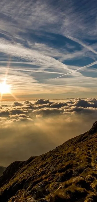 Breathtaking sunrise over mountains and clouds in a serene landscape.