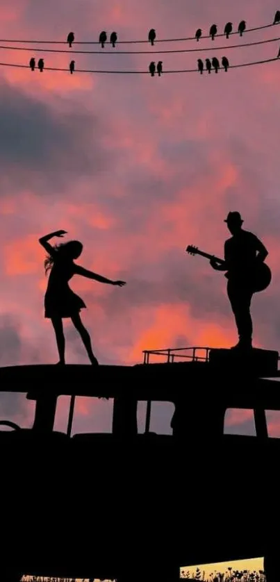 Silhouettes dancing on a van with a sunset sky background.