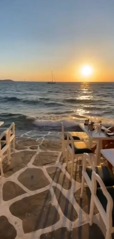 Oceanfront dining at sunset with serene seascape view.