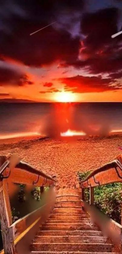 Orange sunset over beach with stairs leading to ocean.