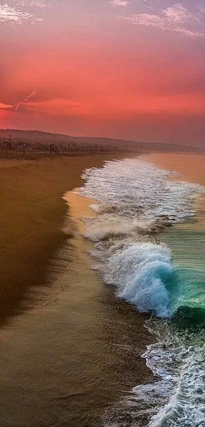 Sunset over ocean waves on serene beach.