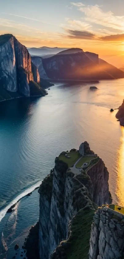 Stunning sunset over a mountain fjord reflecting golden hues.