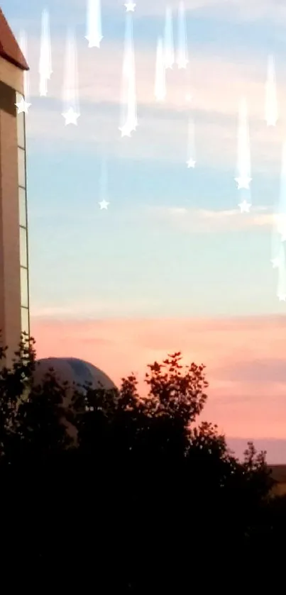 Church silhouette at sunset with pink and blue sky.