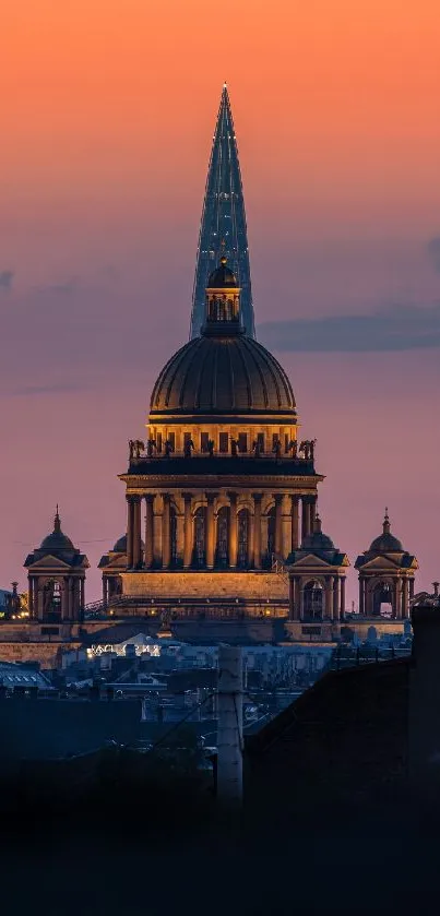 City skyline with orange sunset backdrop and iconic architecture.