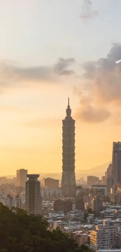 Sunset over a city skyline with an orange sky and towering skyscrapers.