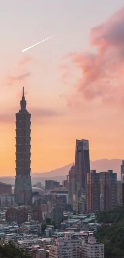 City skyline with peach sunset and prominent tower.