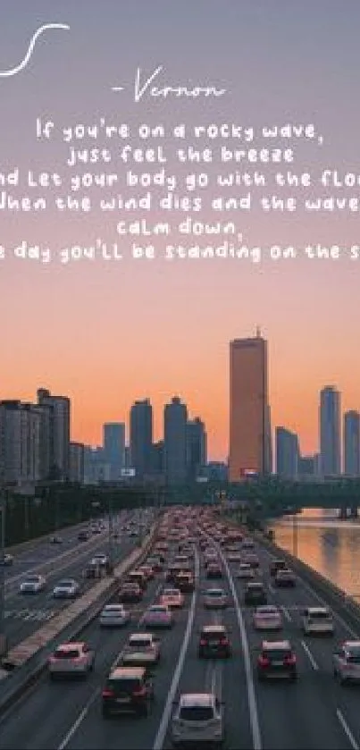 Sunset cityscape with inspiring quote in the foreground.