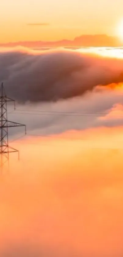 Vibrant orange sunset with clouds and silhouetted power lines.