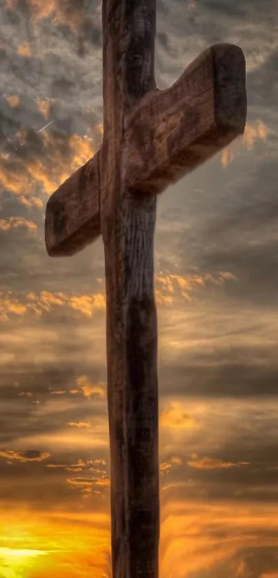 Sunset cross with golden sky creating a peaceful and spiritual phone wallpaper.