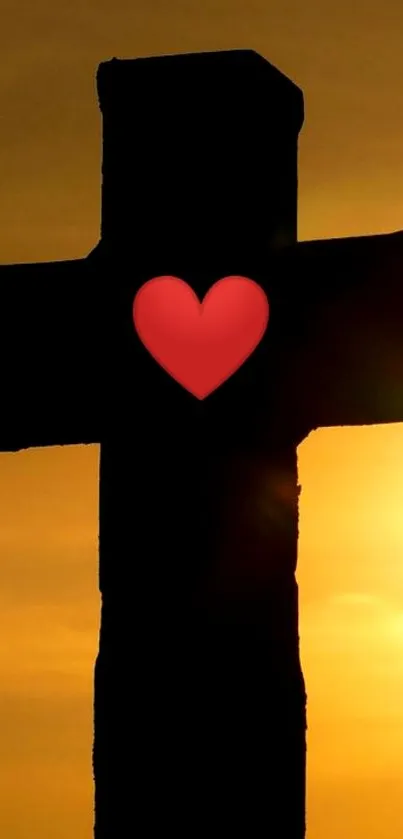 Silhouette of a cross with a heart at sunset, creating a serene scene.