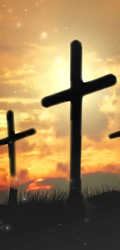 Silhouetted crosses with a sunset sky background.