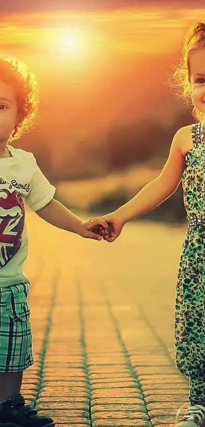 Two children holding hands at sunset in a vibrant, warm-toned setting.